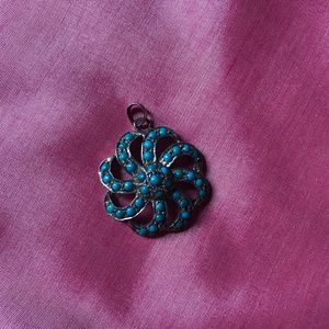turquoise and silver flower pendant